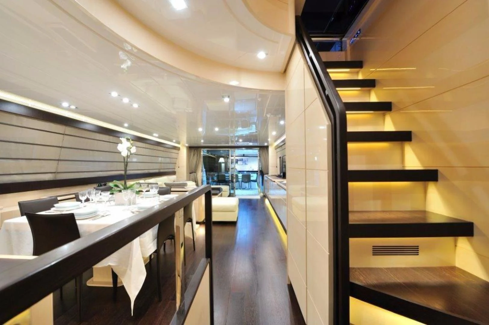 a room with a table and chairs aboard ELLISIUM Yacht for Sale