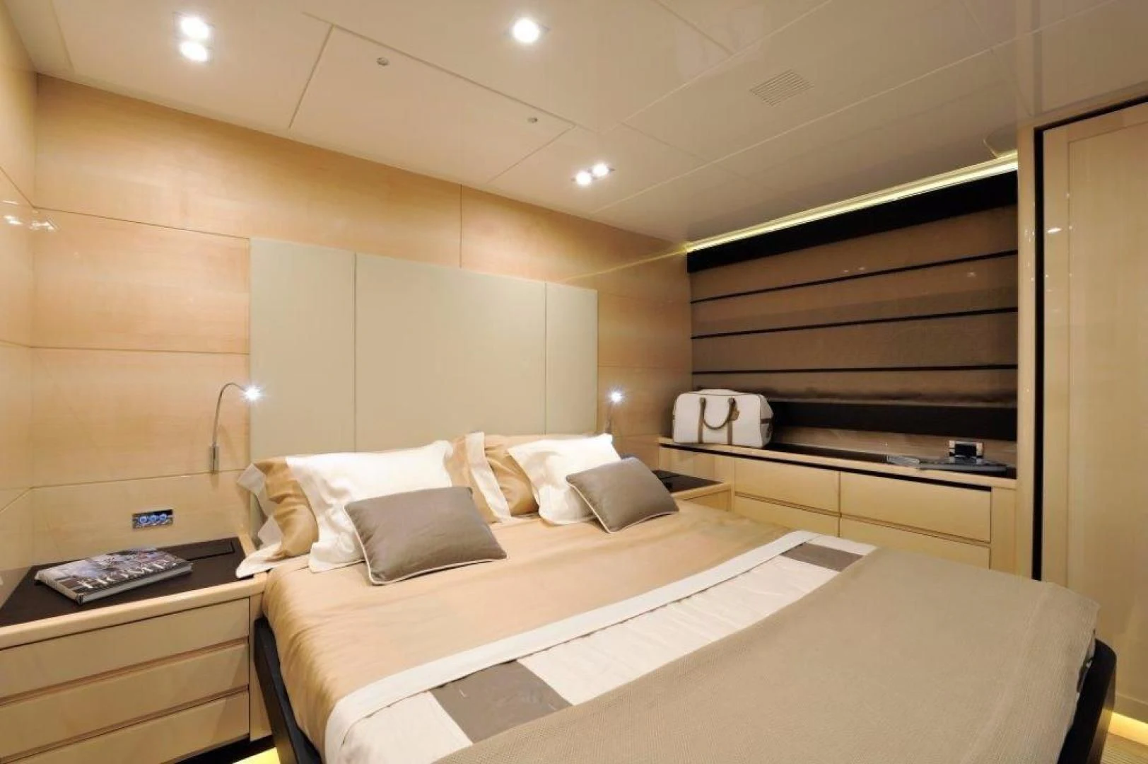 a room with a bed and a desk aboard ELLISIUM Yacht for Sale