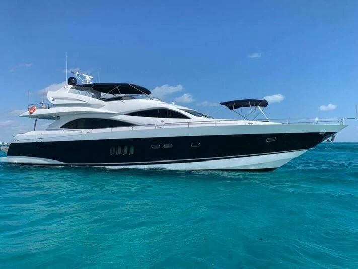 a white yacht in the water aboard JULCAN II Yacht for Sale