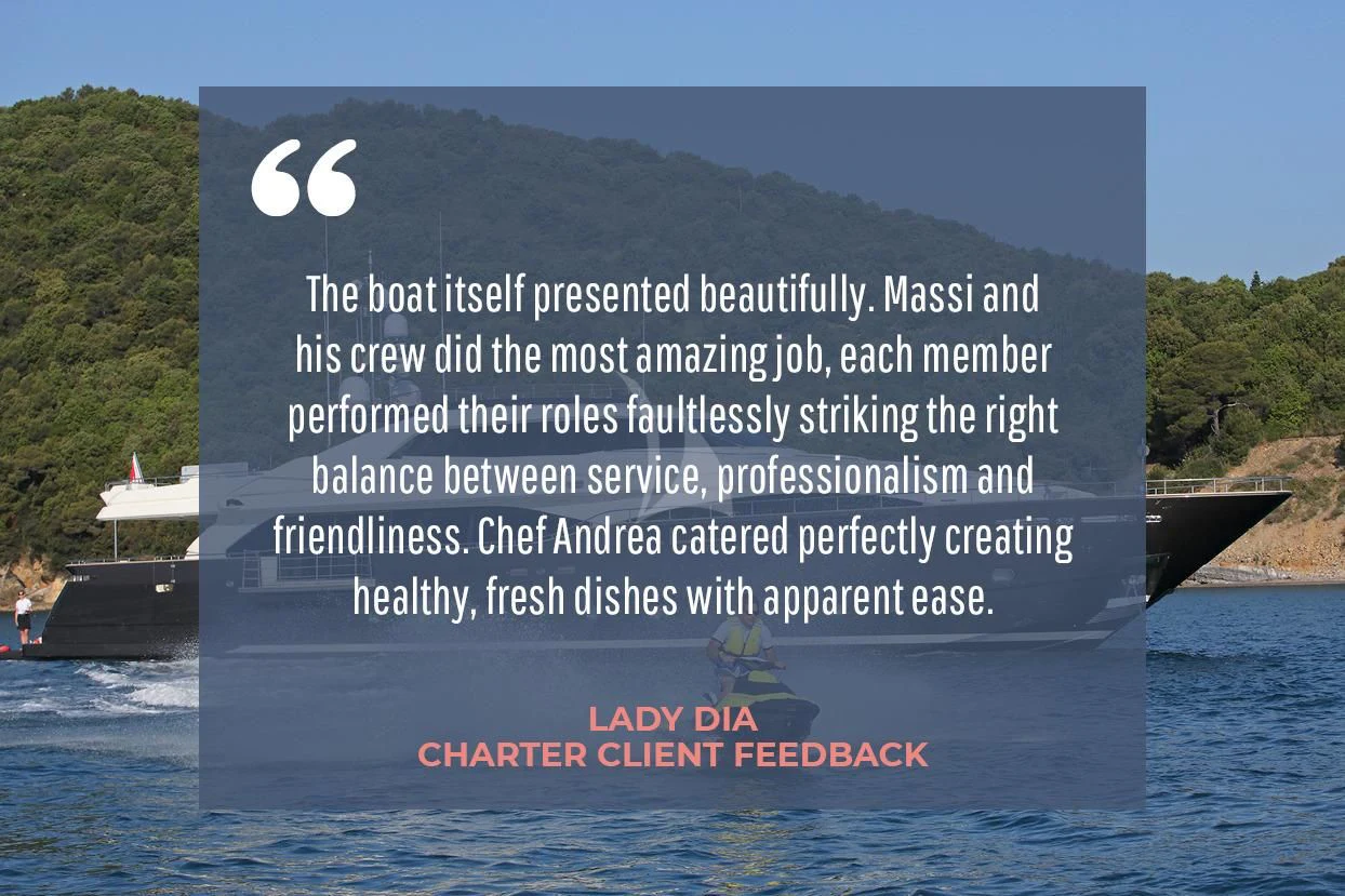 a large black rock with text aboard VELA Yacht for Sale