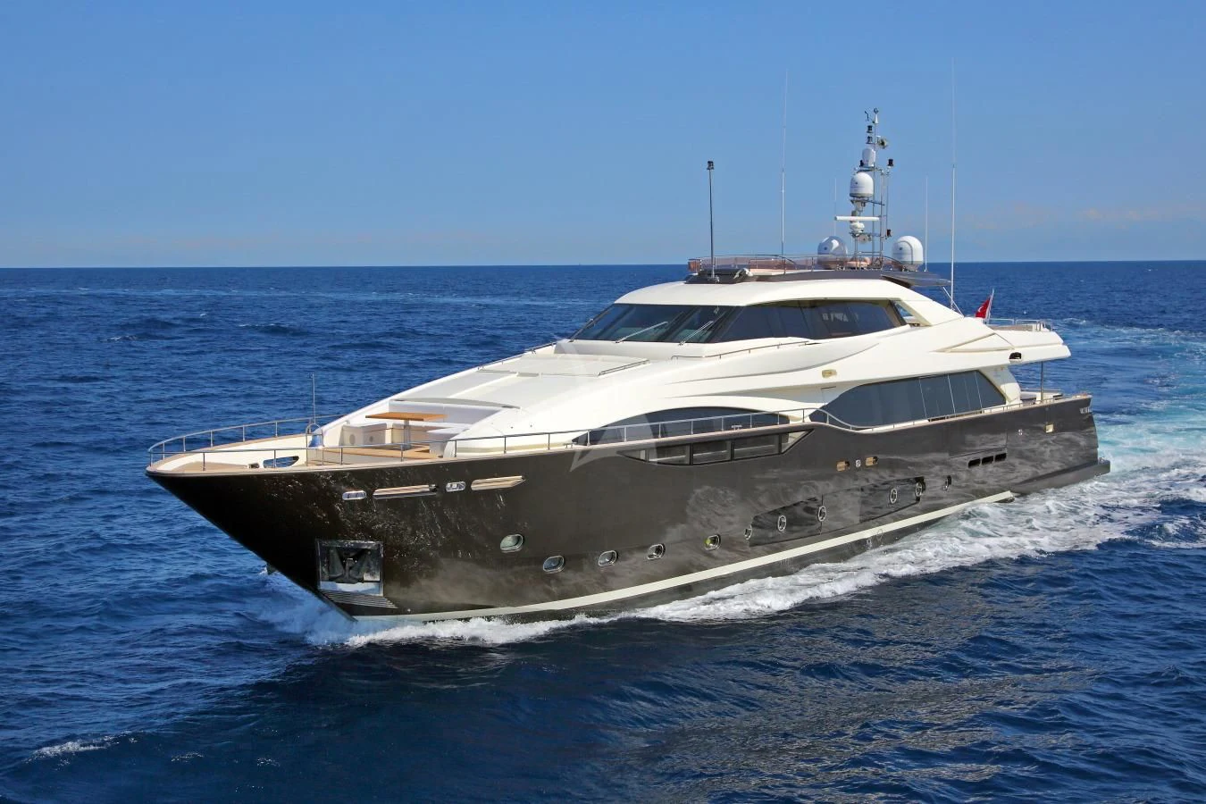 a large white yacht aboard VELA Yacht for Sale