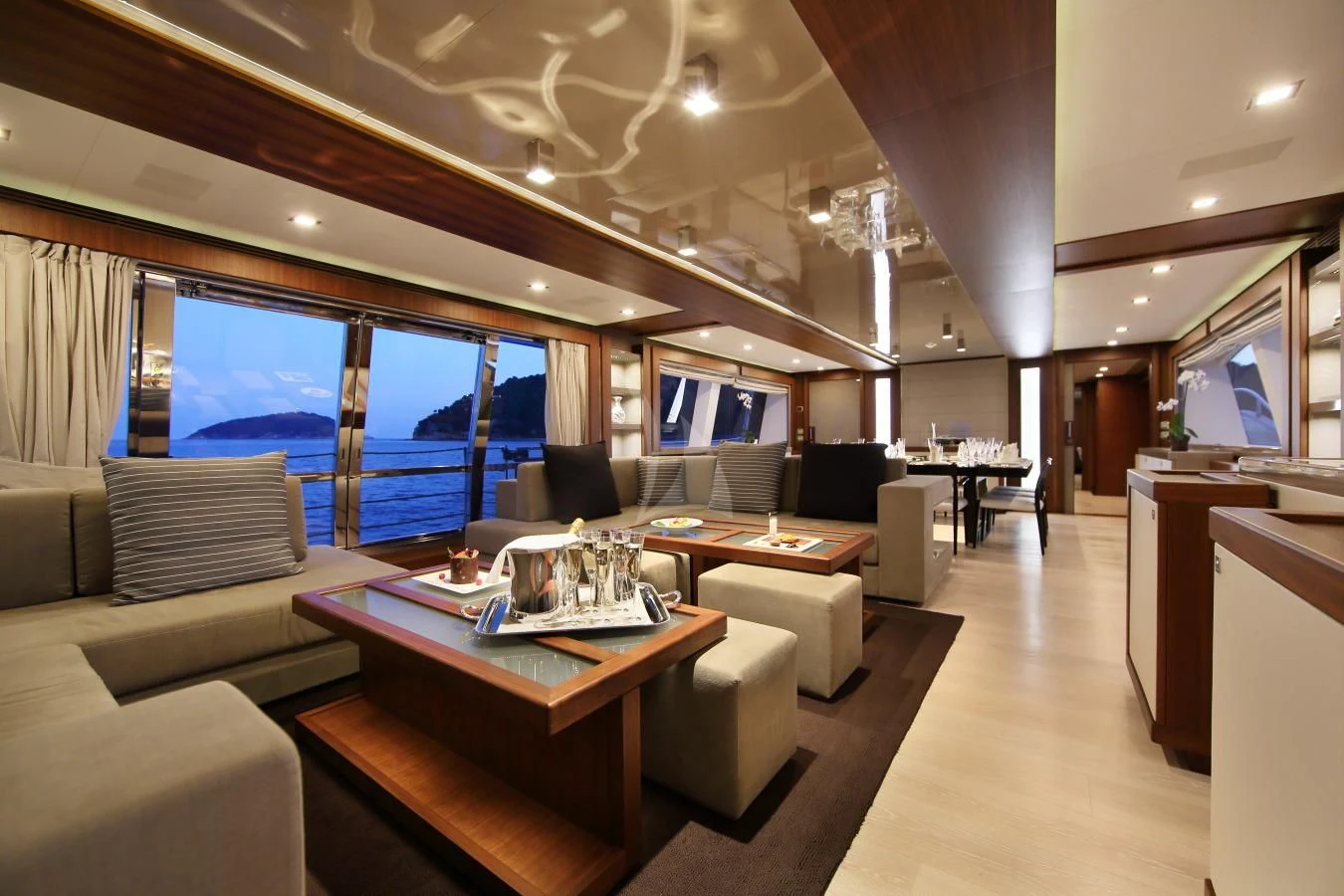 a room with a table and chairs aboard VELA Yacht for Sale