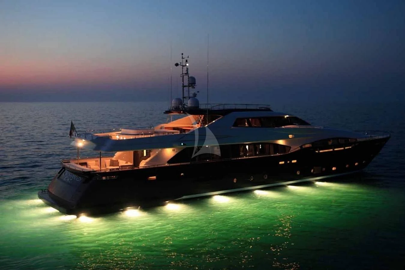 a large boat in the water aboard VELA Yacht for Sale