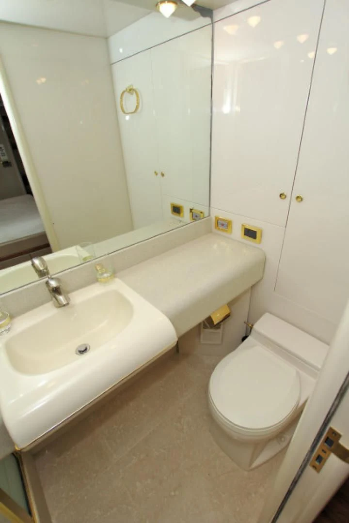 a bathroom with a sink and a toilet aboard CHRISTMAS SPIRIT Yacht for Sale