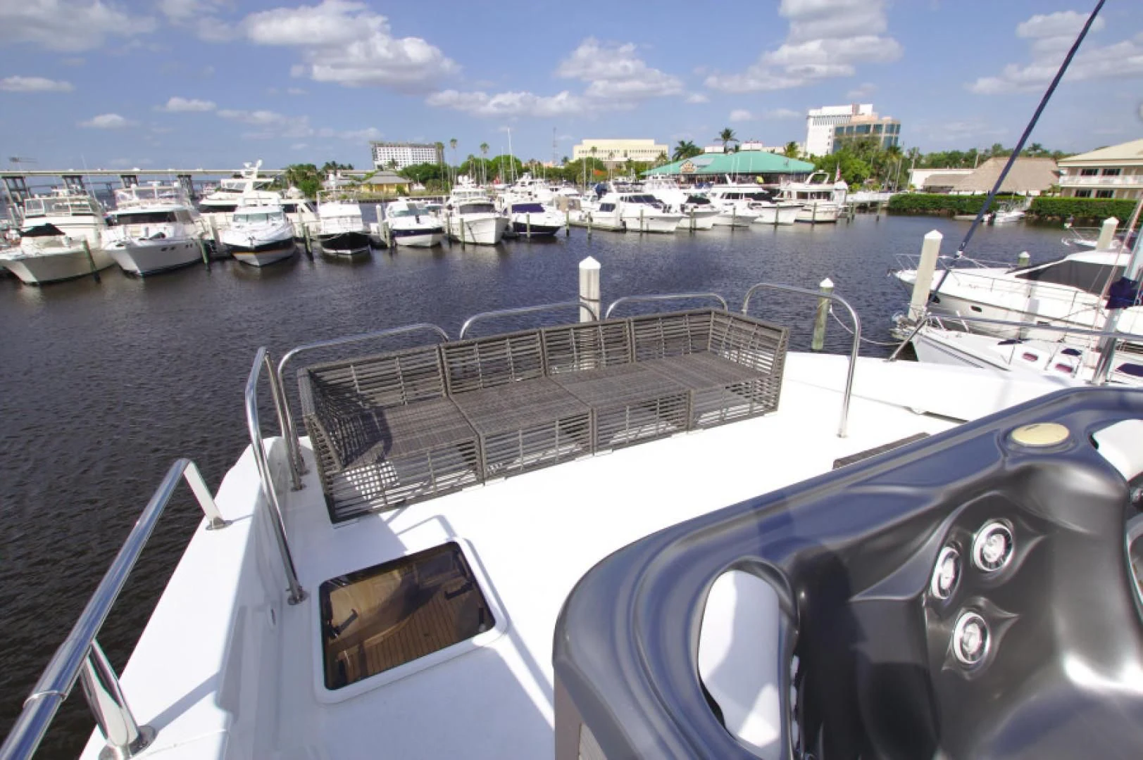 a boat is parked in a harbor aboard CHRISTMAS SPIRIT Yacht for Sale