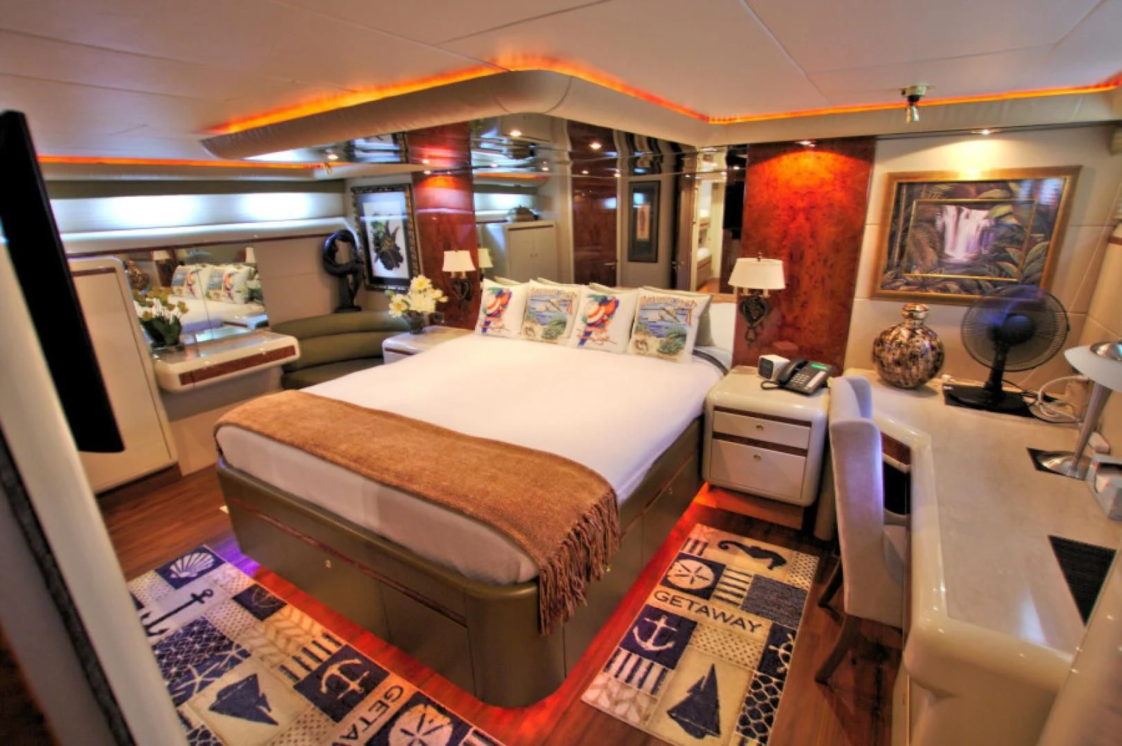 a room with a bed and a desk aboard CHRISTMAS SPIRIT Yacht for Sale