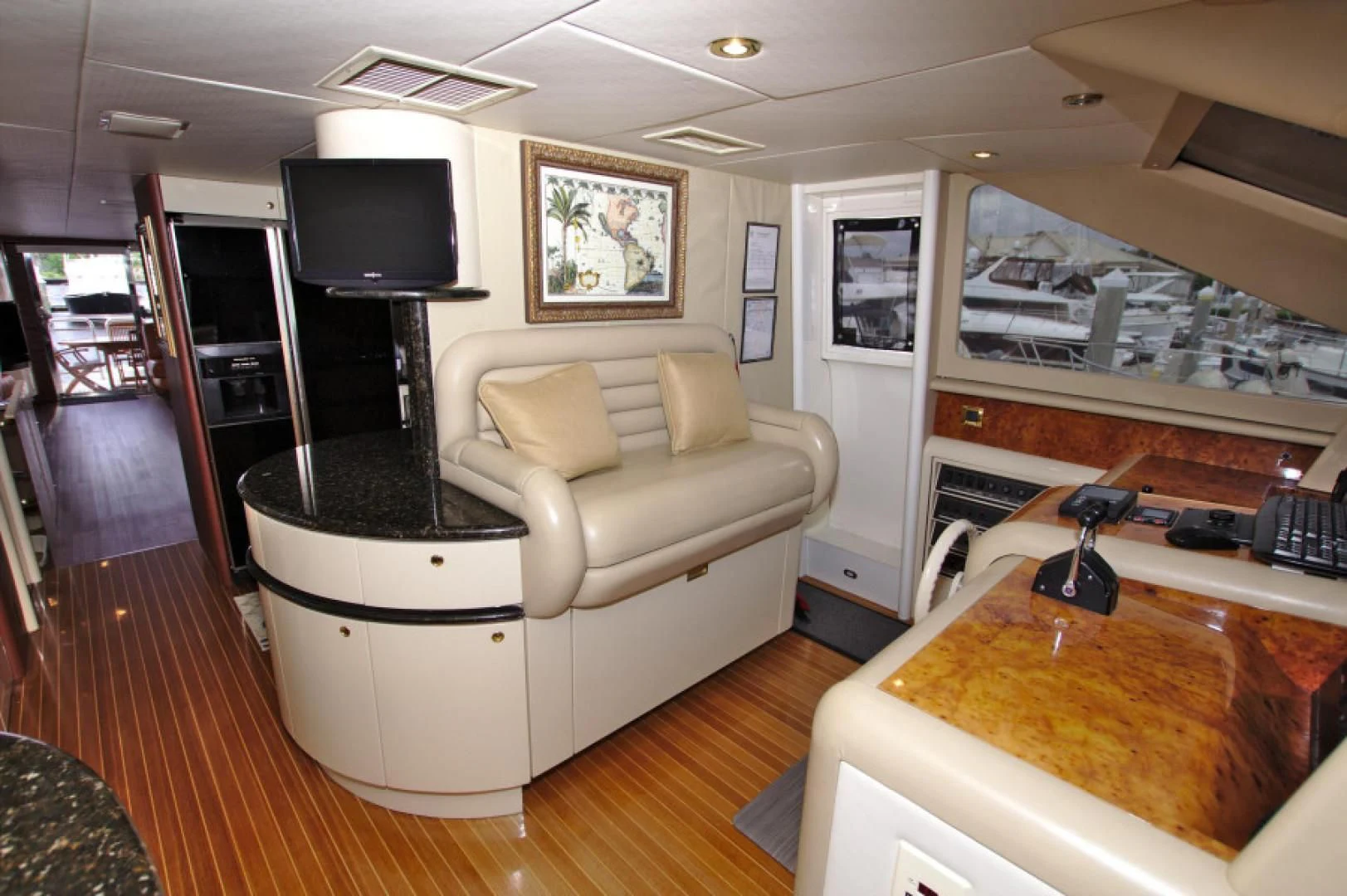 a living room with a large tv aboard CHRISTMAS SPIRIT Yacht for Sale