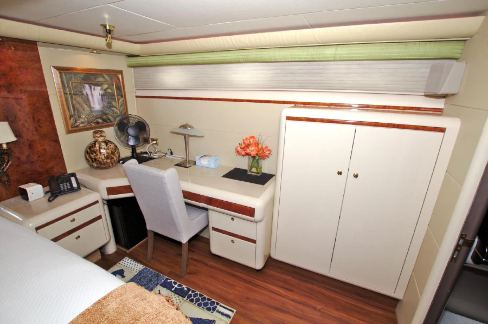 a room with a desk and a bed aboard CHRISTMAS SPIRIT Yacht for Sale