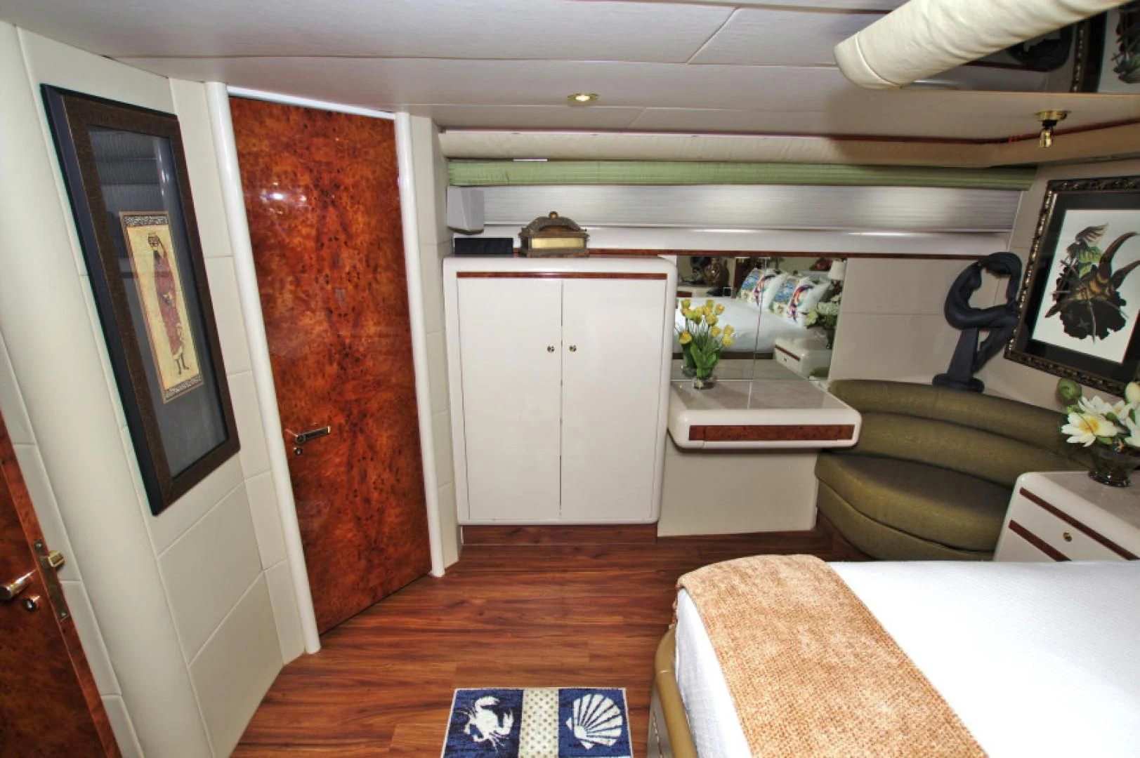 a room with a couch and a table aboard CHRISTMAS SPIRIT Yacht for Sale