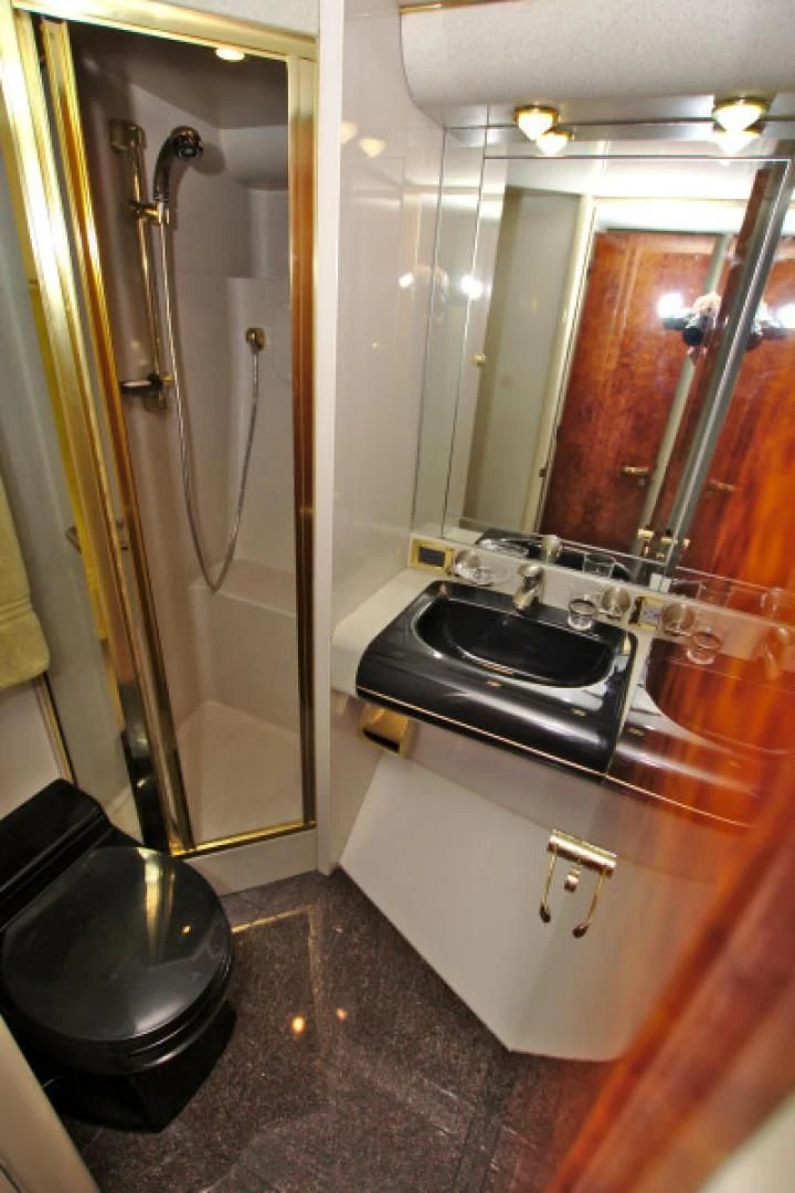 a bathroom with a sink and a shower aboard CHRISTMAS SPIRIT Yacht for Sale