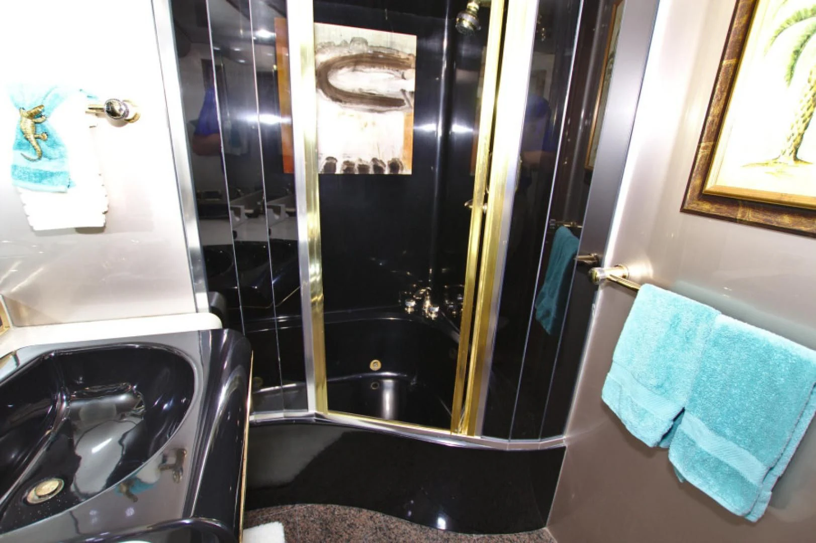 a bathroom with a glass shower aboard CHRISTMAS SPIRIT Yacht for Sale