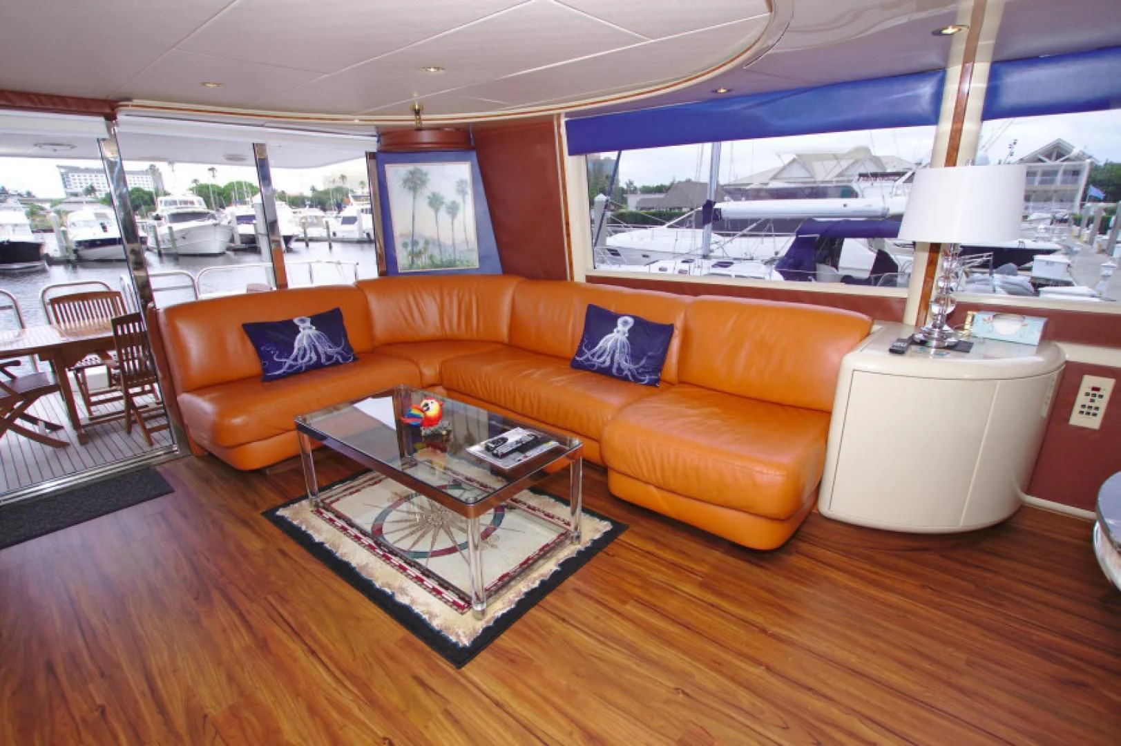 a living room with a couch and a table aboard CHRISTMAS SPIRIT Yacht for Sale