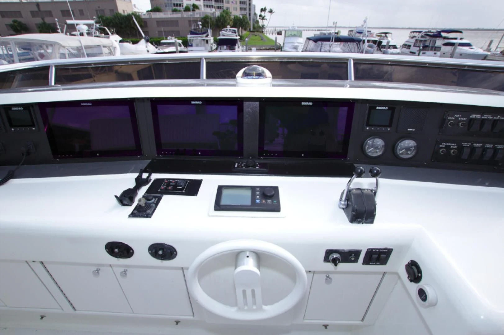a white vehicle with a screen and buttons on the front aboard CHRISTMAS SPIRIT Yacht for Sale
