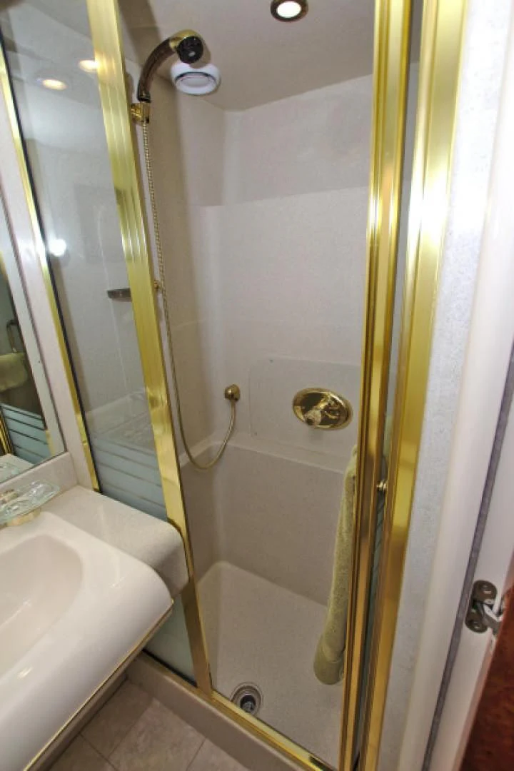 a shower with a glass door aboard CHRISTMAS SPIRIT Yacht for Sale