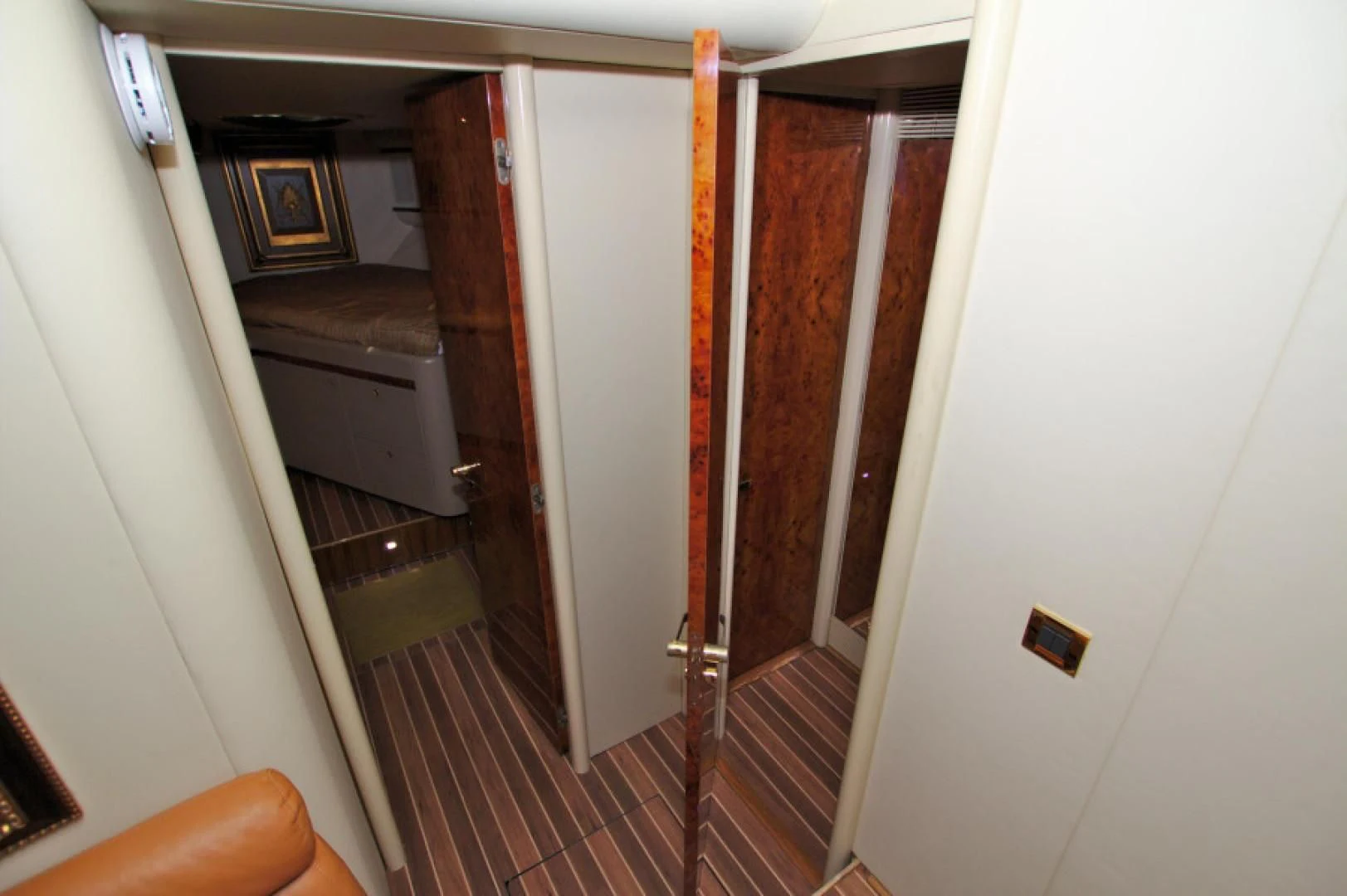 a hallway with a door and a wood door aboard CHRISTMAS SPIRIT Yacht for Sale