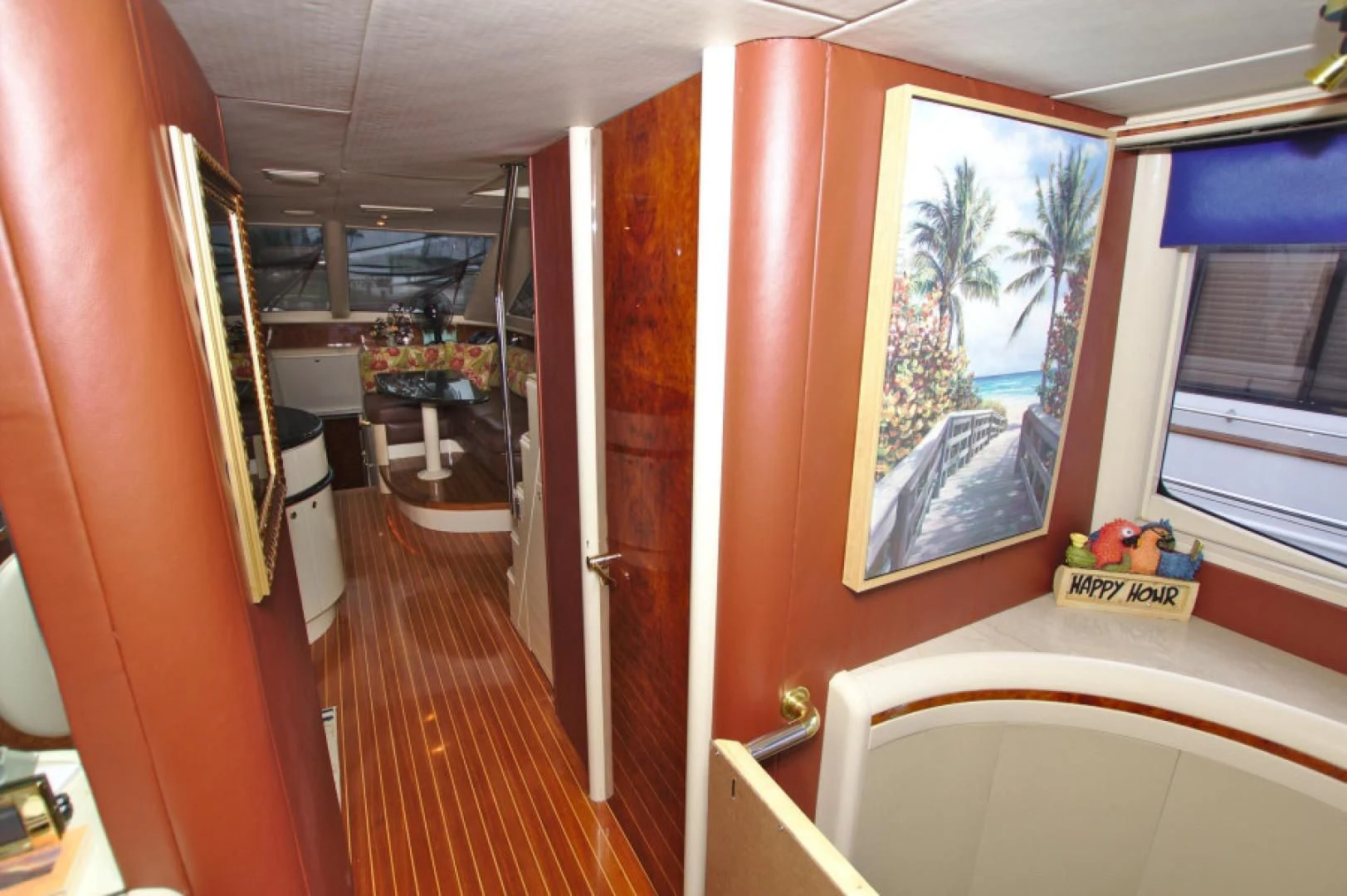 a bathroom with a tub and a door aboard CHRISTMAS SPIRIT Yacht for Sale
