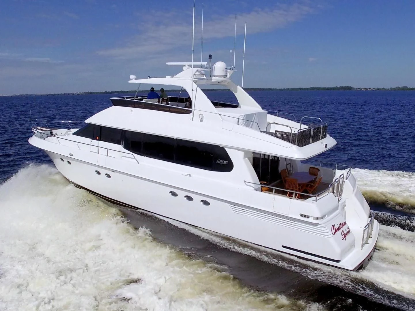 a boat on the water aboard CHRISTMAS SPIRIT Yacht for Sale