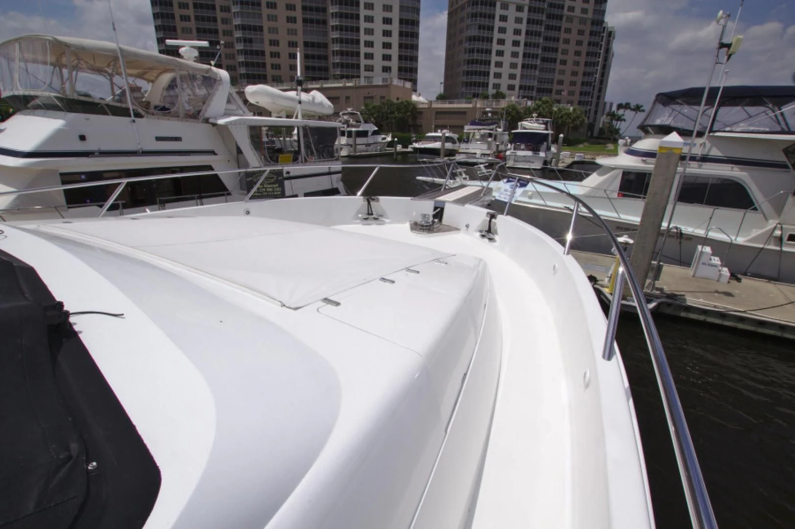 a group of boats are parked in a harbor aboard CHRISTMAS SPIRIT Yacht for Sale