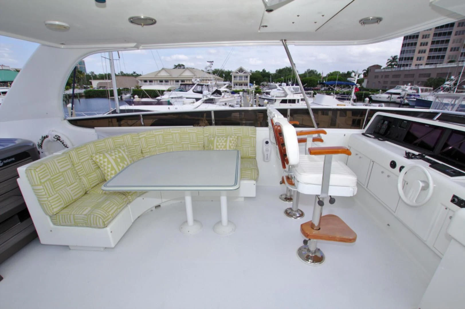 a room with a table and chairs aboard CHRISTMAS SPIRIT Yacht for Sale