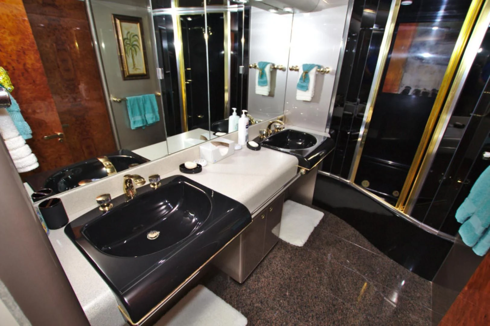 a bathroom with a large mirror aboard CHRISTMAS SPIRIT Yacht for Sale