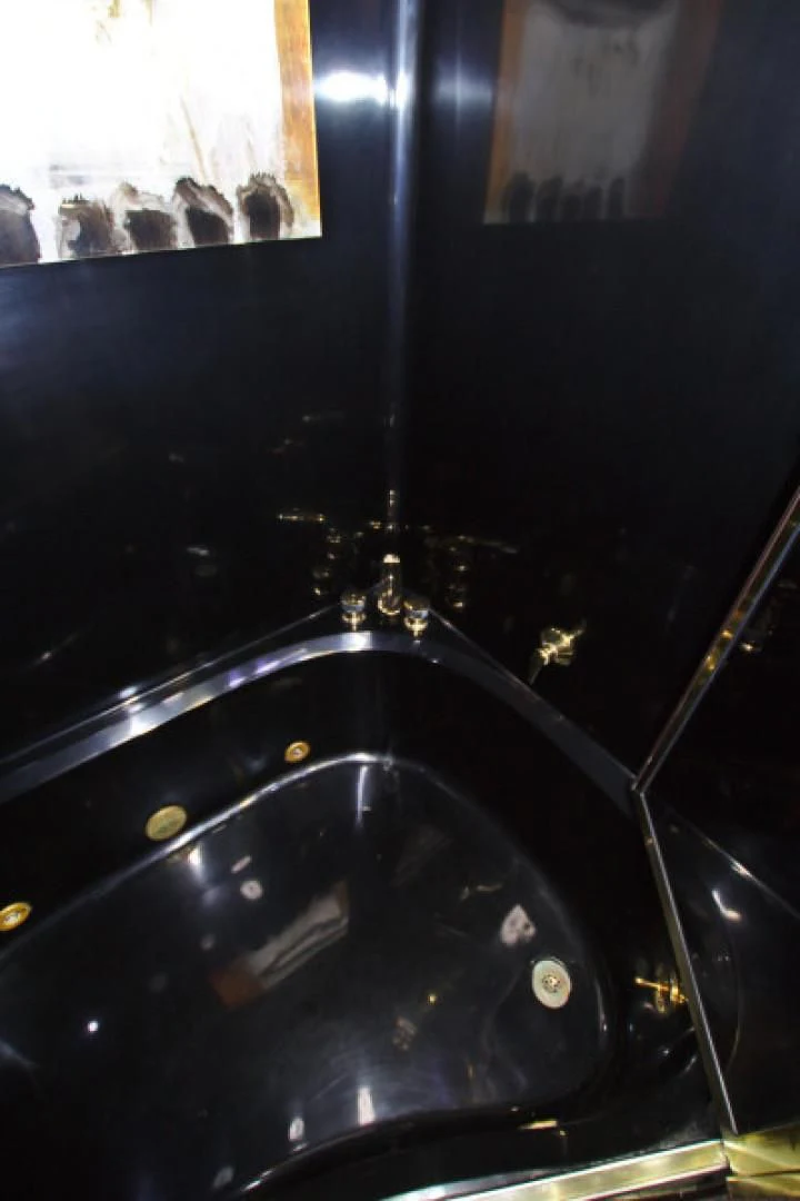 a black sink with a black faucet aboard CHRISTMAS SPIRIT Yacht for Sale