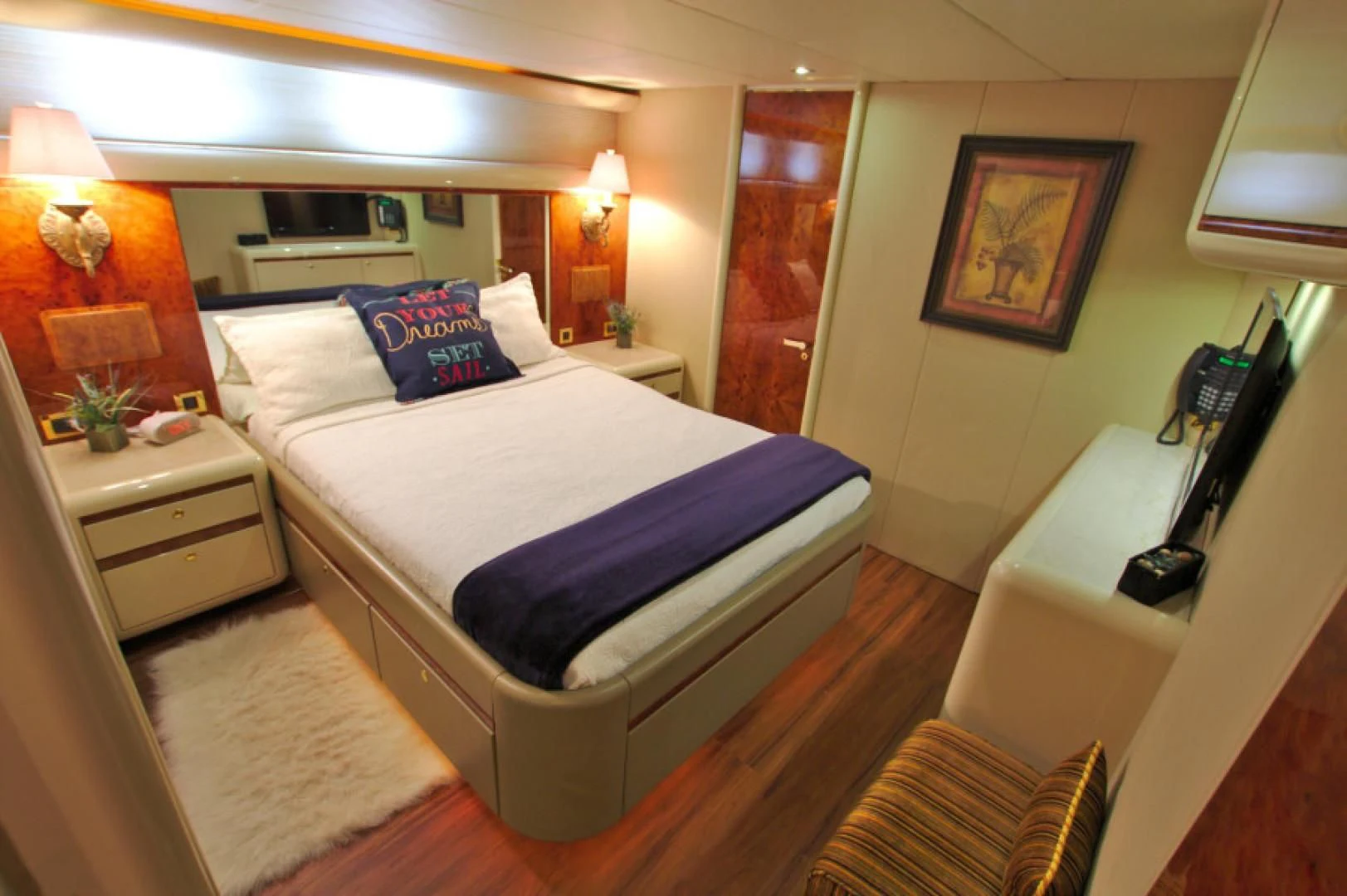 a bed with a blue sheet aboard CHRISTMAS SPIRIT Yacht for Sale