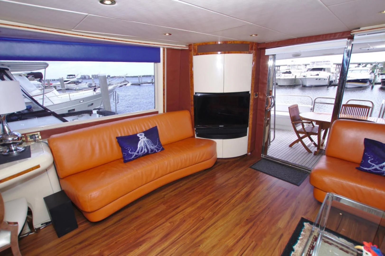 a living room with a large window aboard CHRISTMAS SPIRIT Yacht for Sale