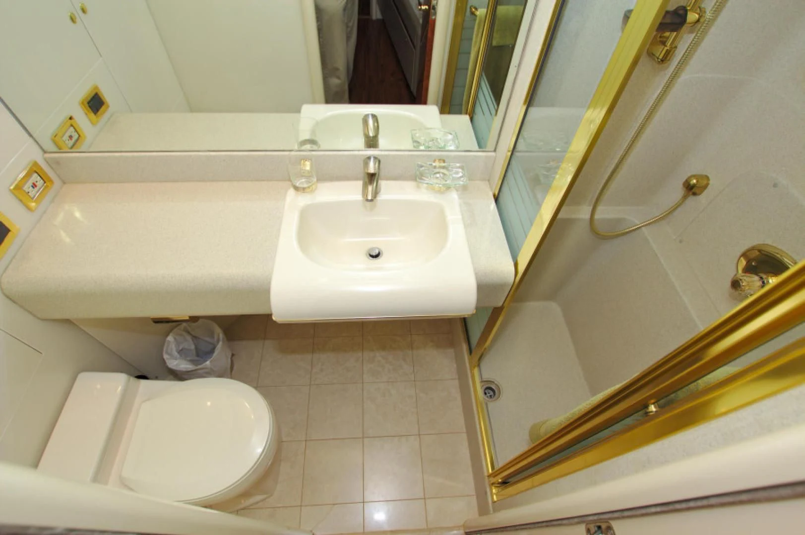 a bathroom with a sink and a mirror aboard CHRISTMAS SPIRIT Yacht for Sale