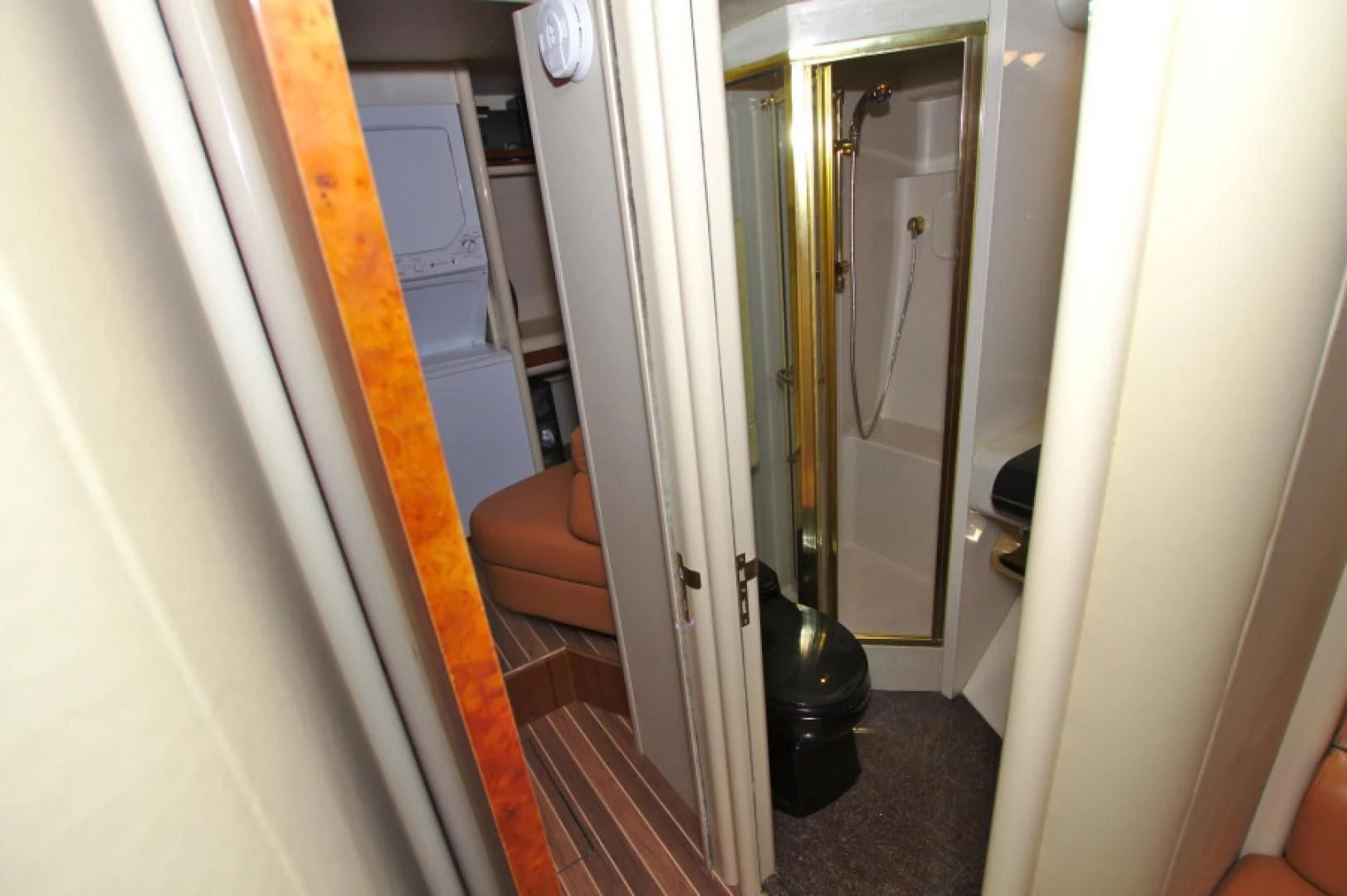 a hallway with a black bucket aboard CHRISTMAS SPIRIT Yacht for Sale