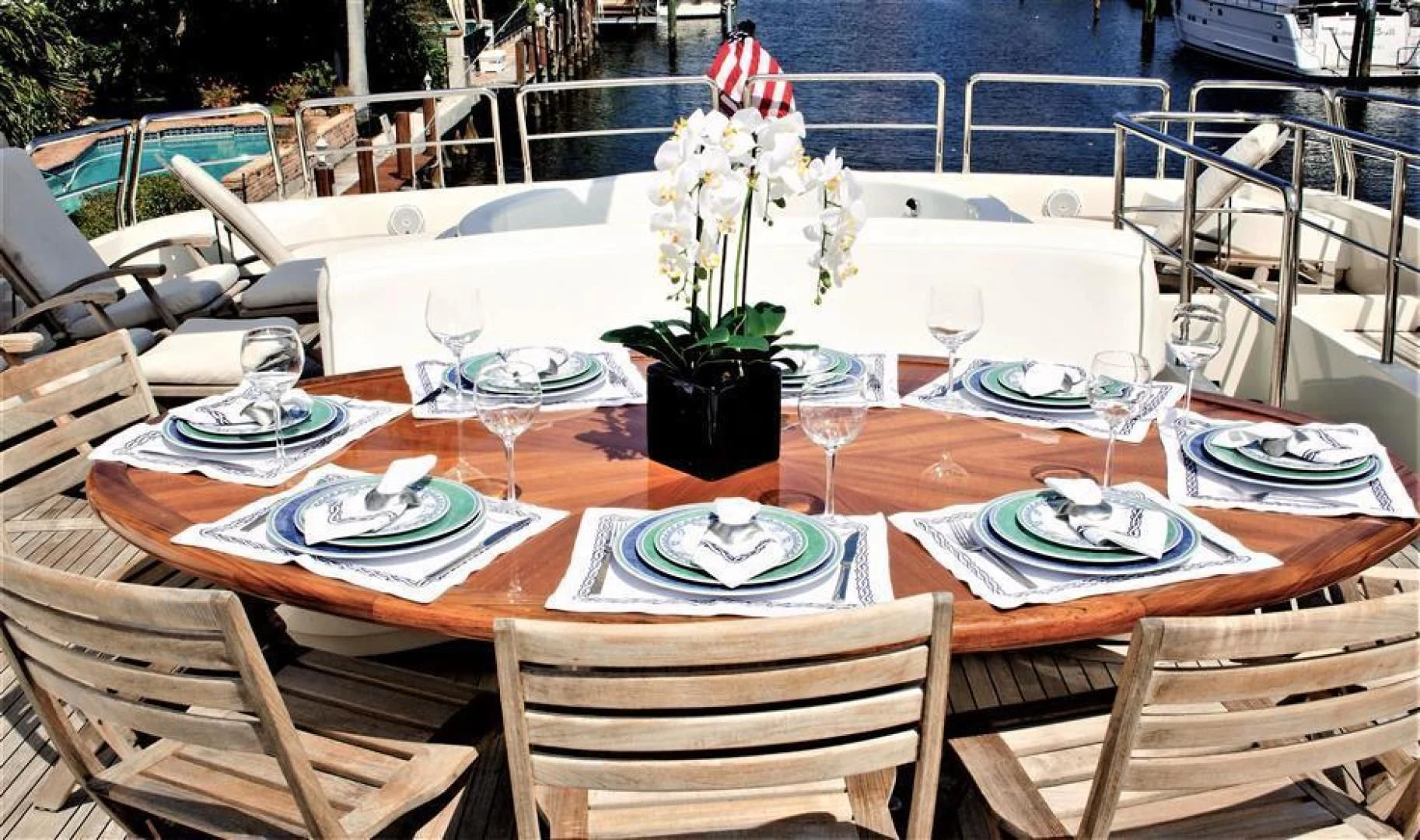 a table set with place settings aboard CAROBELLE Yacht for Sale