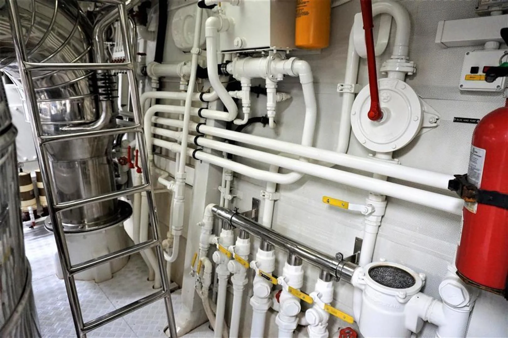 a group of white pipes aboard CAROBELLE Yacht for Sale