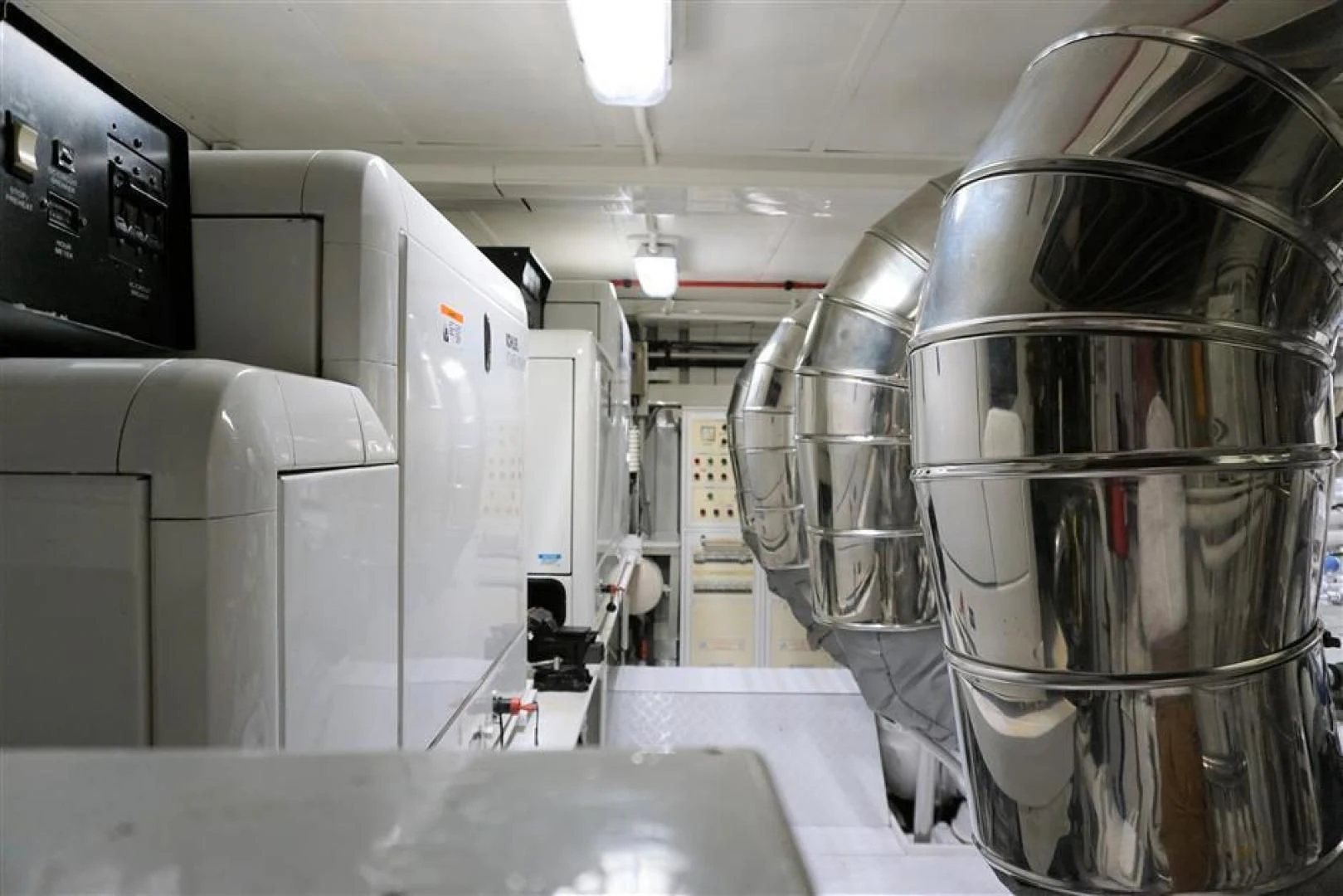 a room with several machines aboard CAROBELLE Yacht for Sale