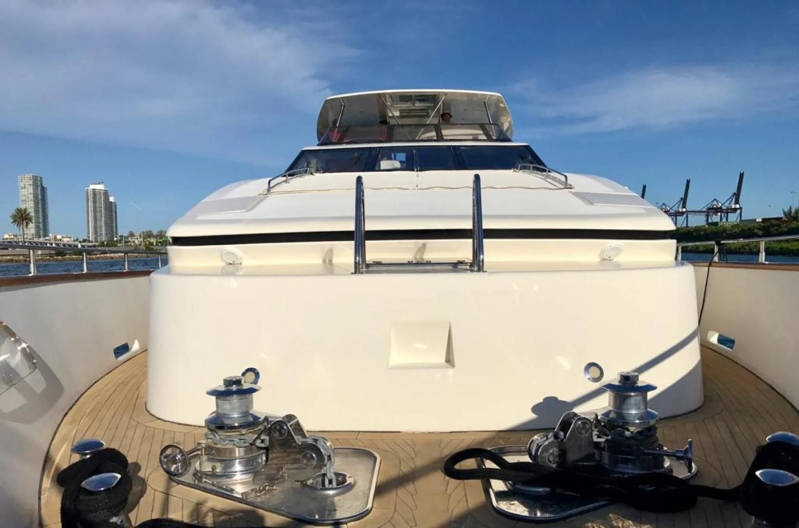 a white boat on a stand aboard CAROBELLE Yacht for Sale