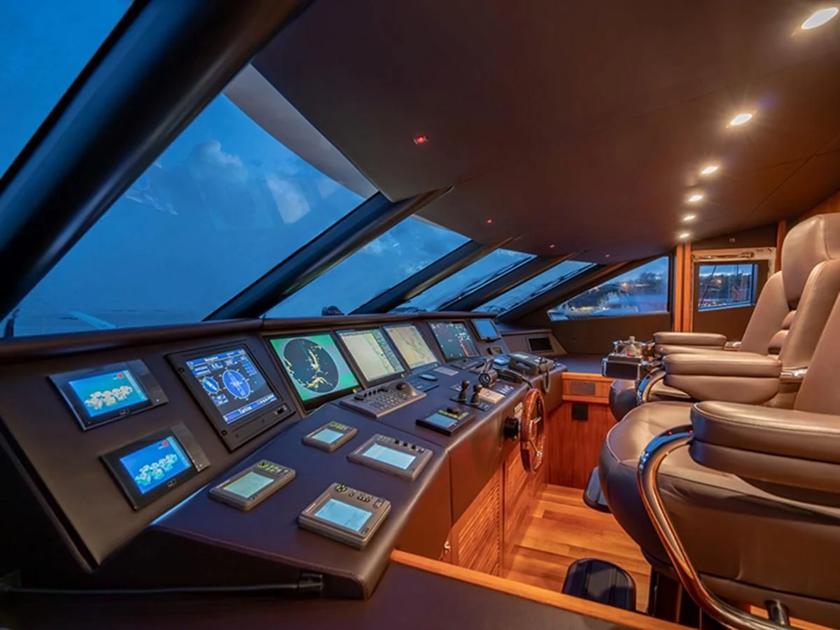 inside of a vehicle with many screens aboard ABOUT TIME Yacht for Sale