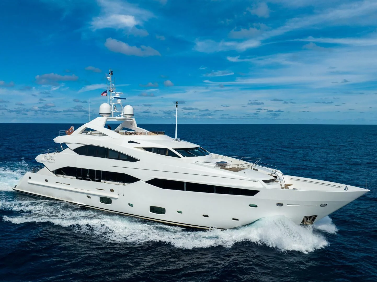 a white yacht in the water aboard ABOUT TIME Yacht for Sale