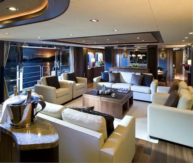 a living room with a large window aboard ABOUT TIME Yacht for Sale