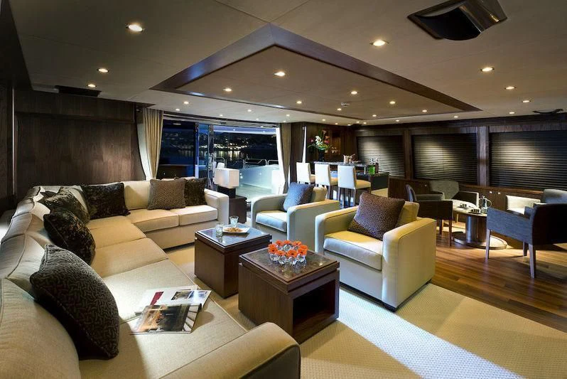a living room with a large window aboard ABOUT TIME Yacht for Sale