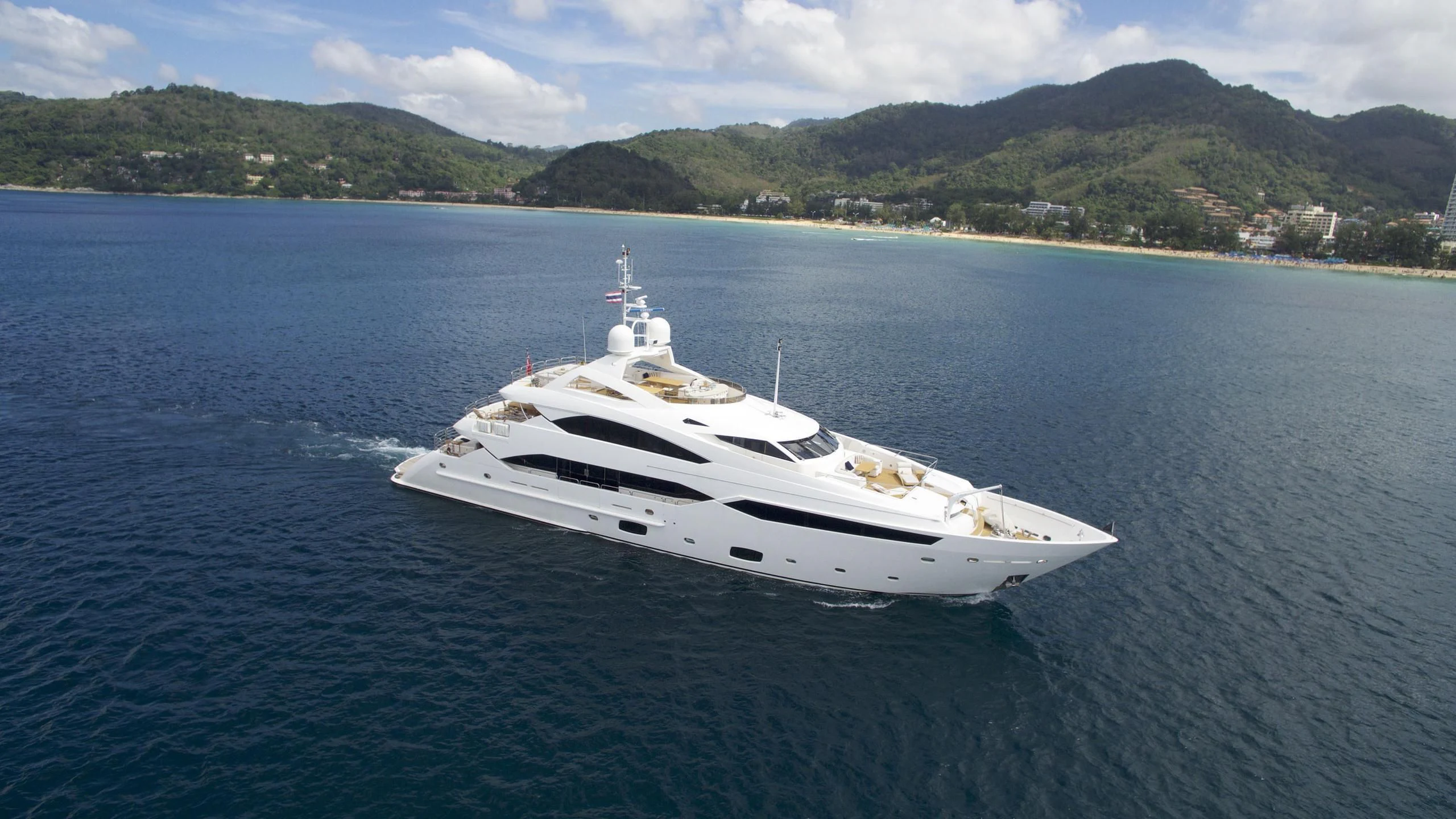 a white yacht in the water aboard ABOUT TIME Yacht for Sale