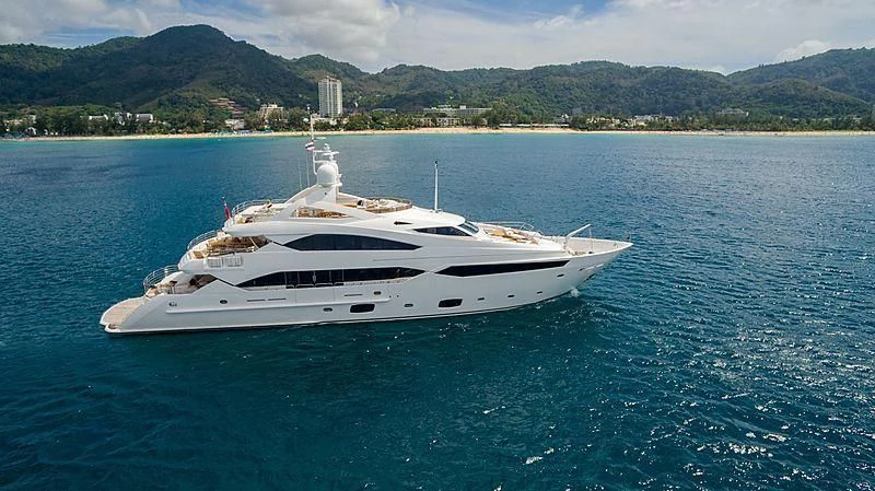 a white yacht in the water aboard ABOUT TIME Yacht for Sale