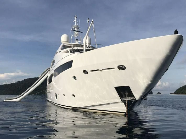 a white boat in the water aboard ABOUT TIME Yacht for Sale