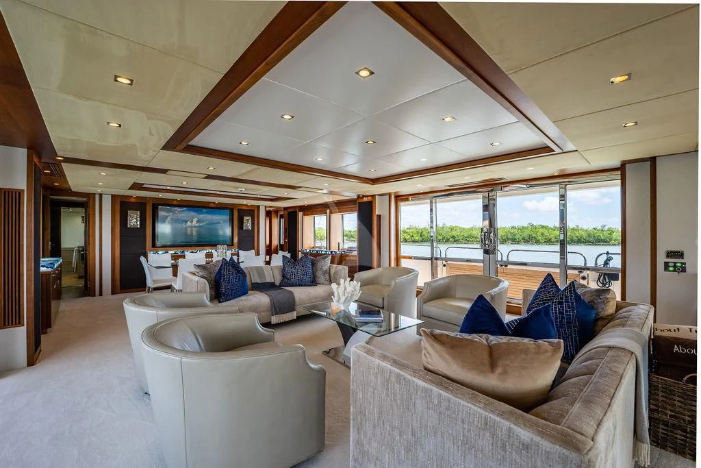 a living room with a large window aboard ABOUT TIME Yacht for Sale