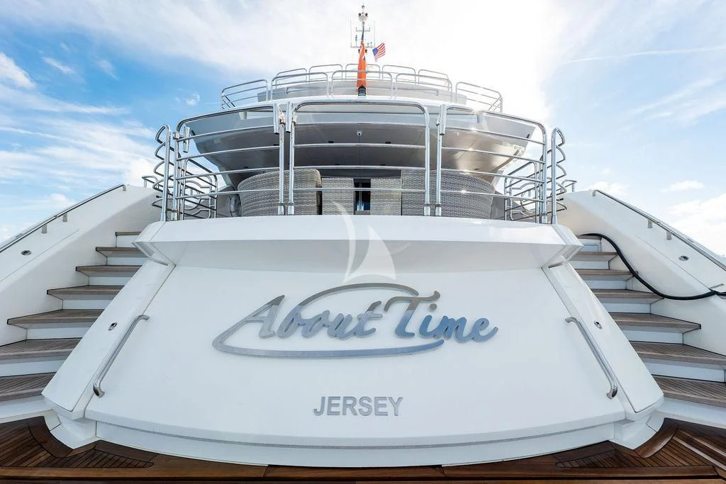 a white boat with a sign on it aboard ABOUT TIME Yacht for Sale