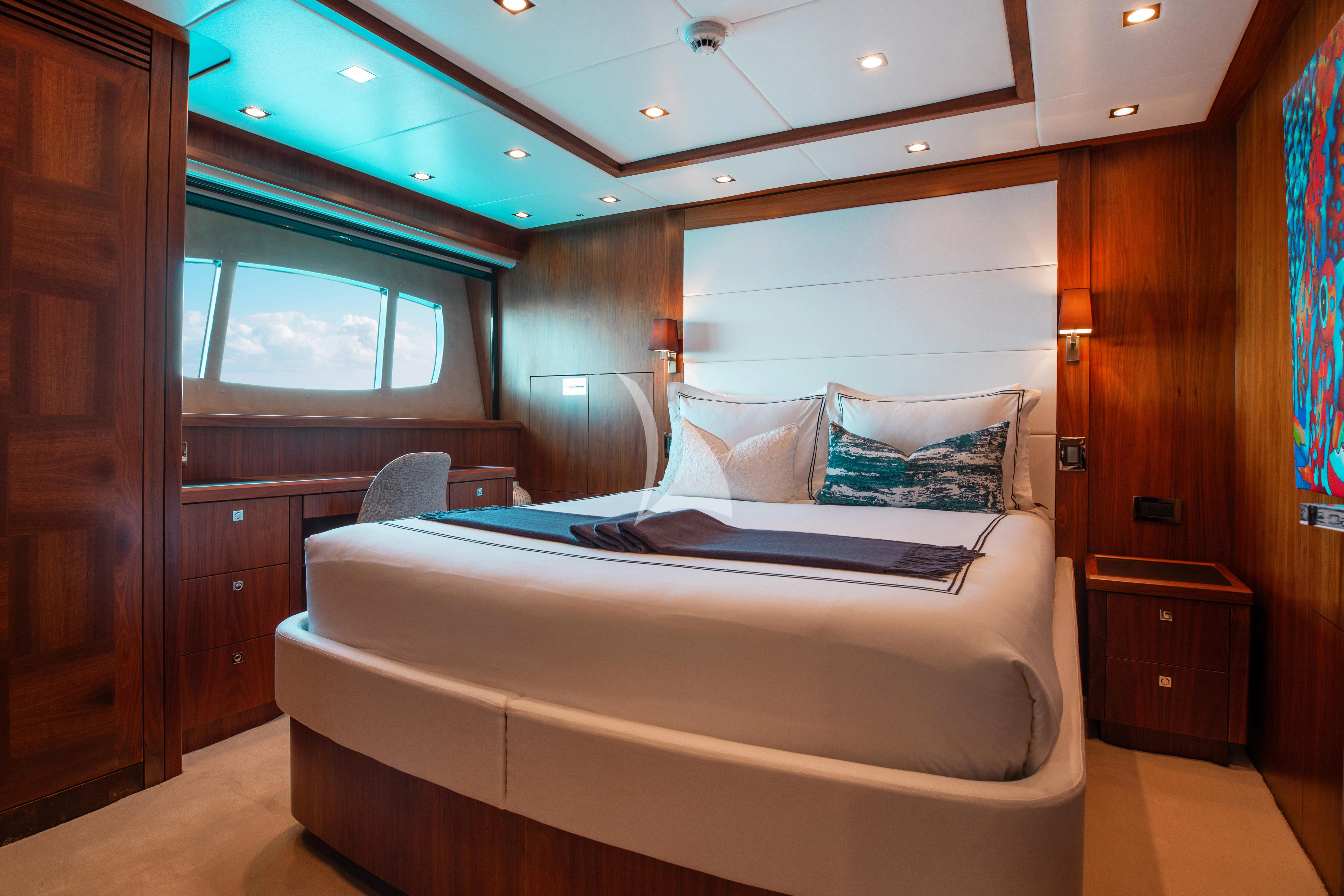 a bed in a room aboard ABOUT TIME Yacht for Sale
