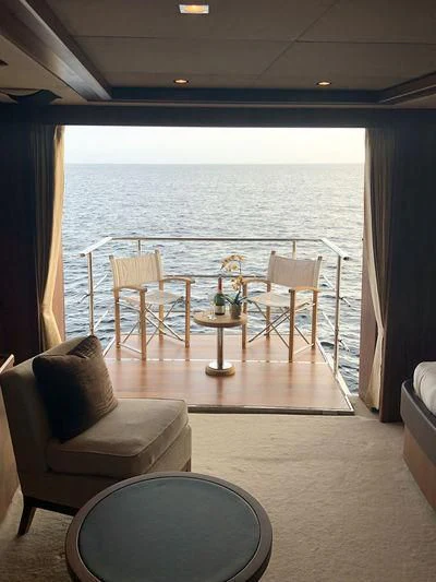 a room with a table and chairs aboard ABOUT TIME Yacht for Sale