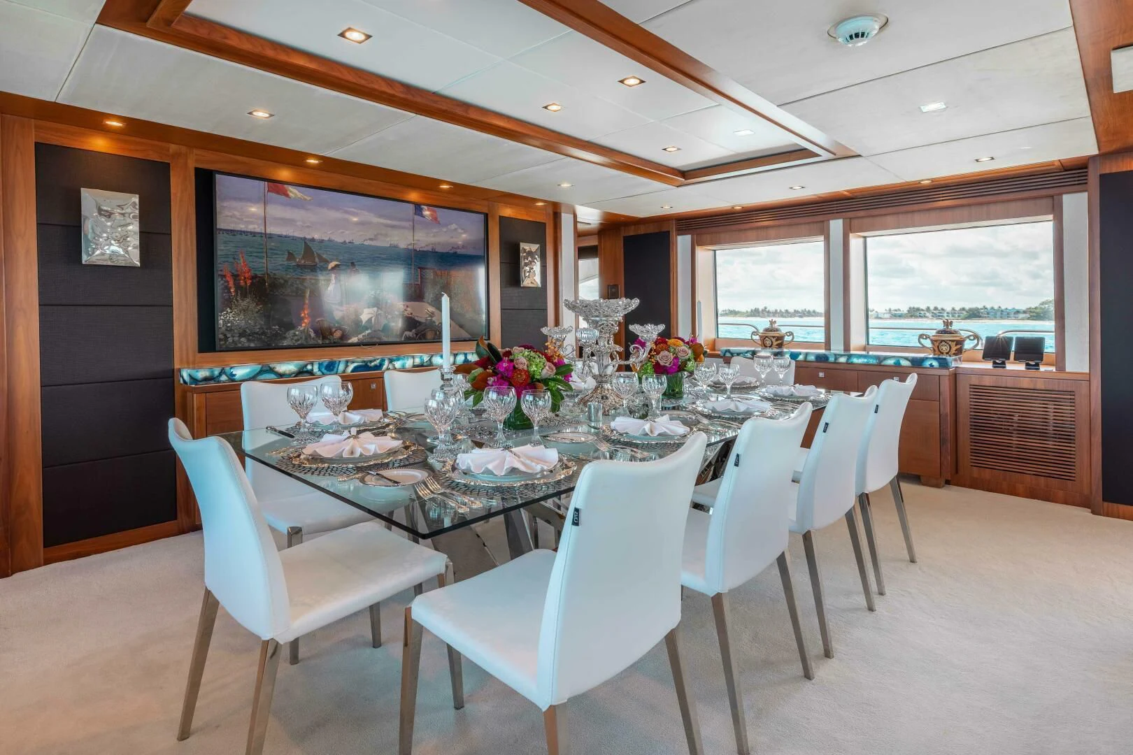 a dining table set for a dinner party aboard ABOUT TIME Yacht for Sale