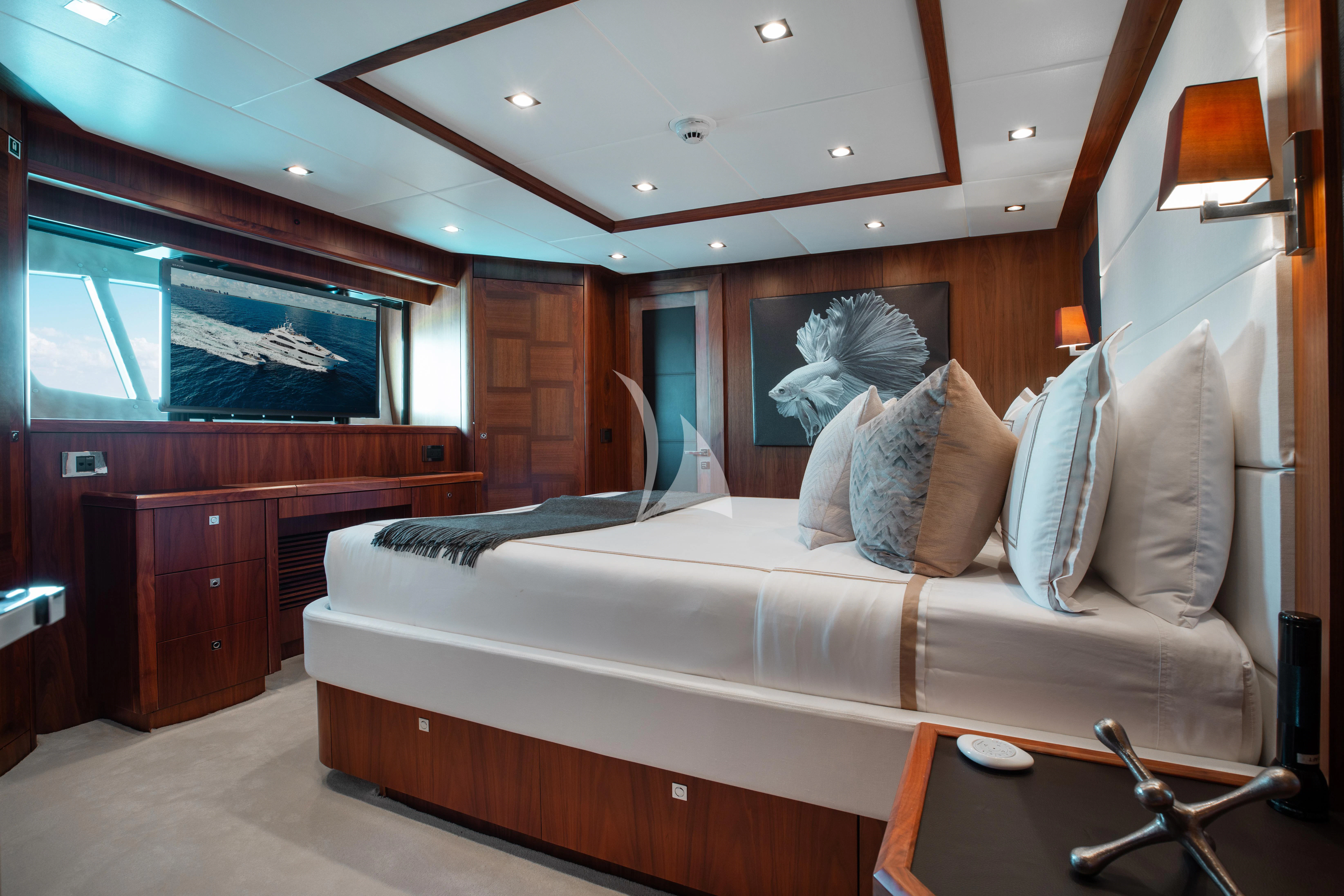 a large bed in a room aboard ABOUT TIME Yacht for Sale