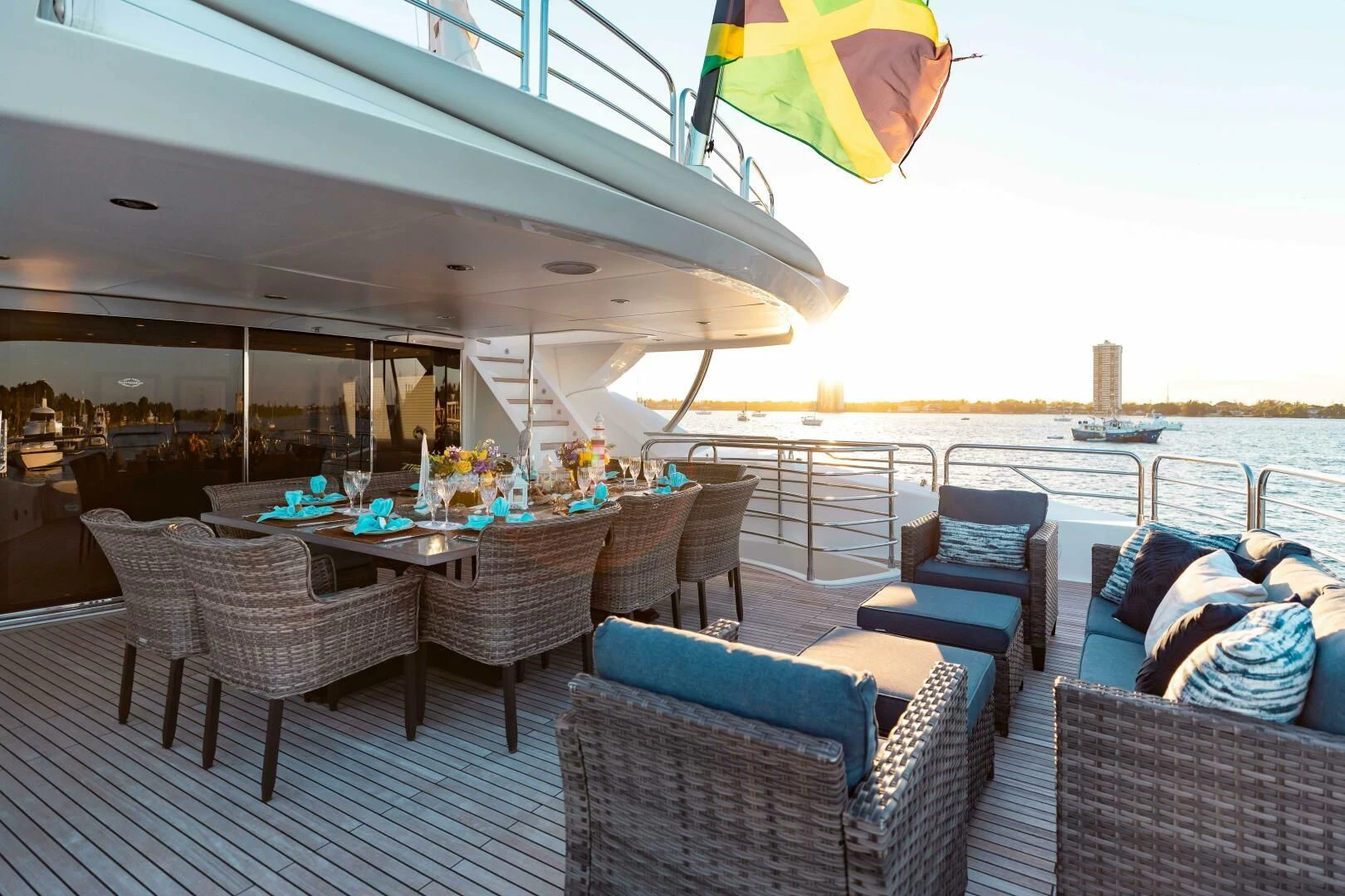 a patio with a table and chairs aboard ABOUT TIME Yacht for Sale
