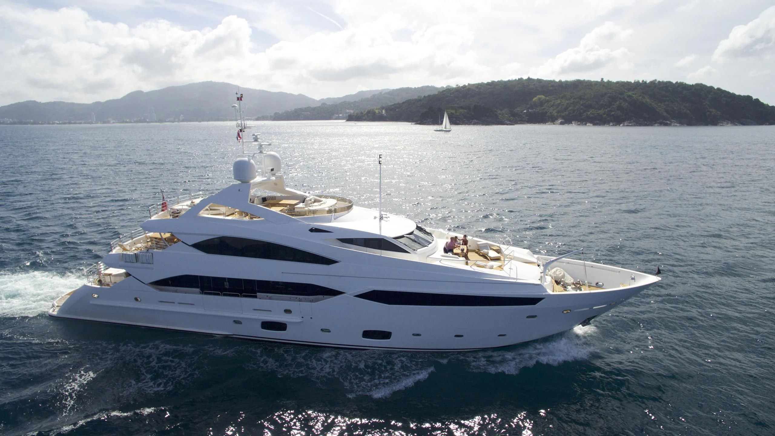 a white yacht on the water aboard ABOUT TIME Yacht for Sale