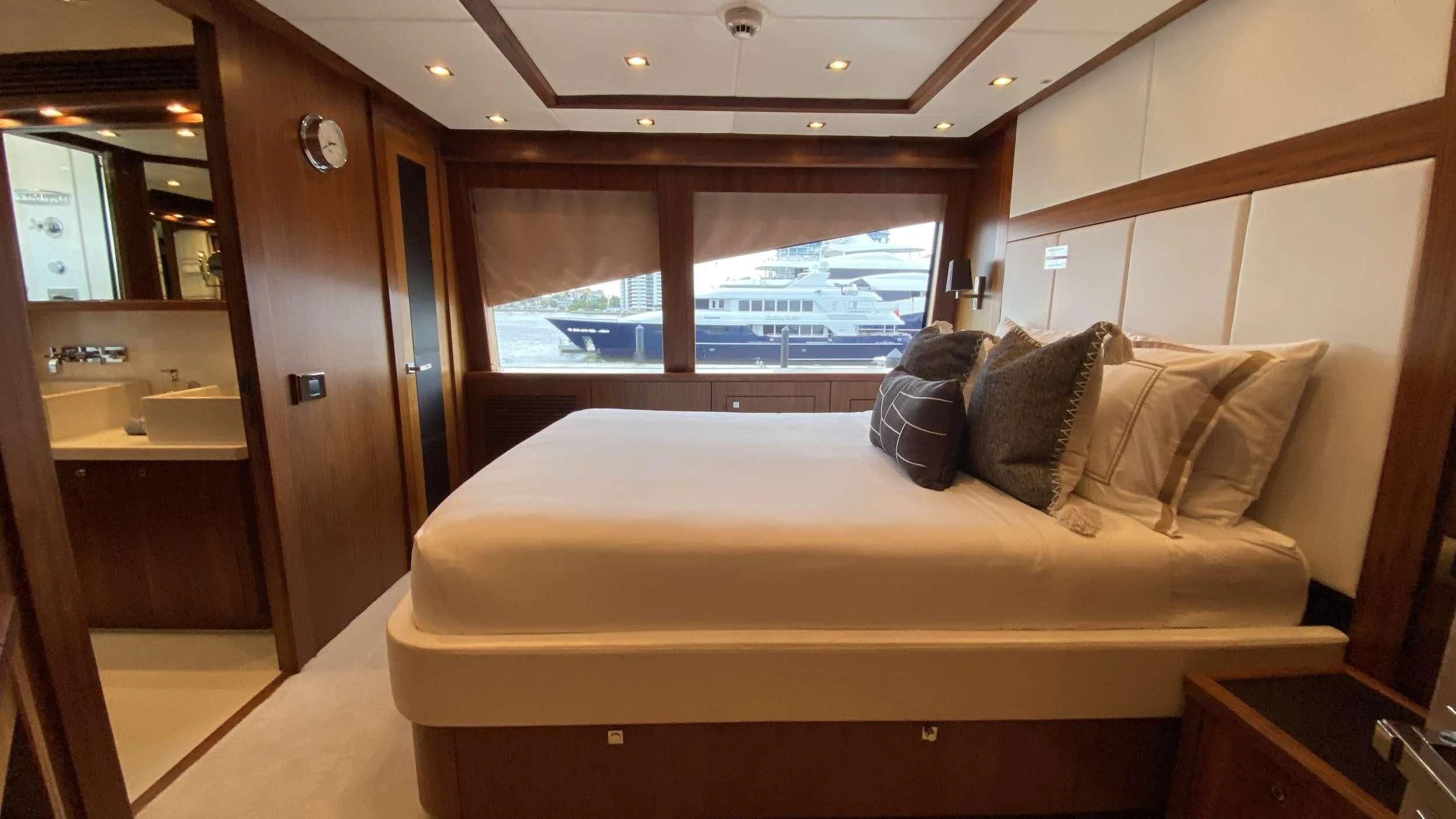 a bed in a room aboard ABOUT TIME Yacht for Sale