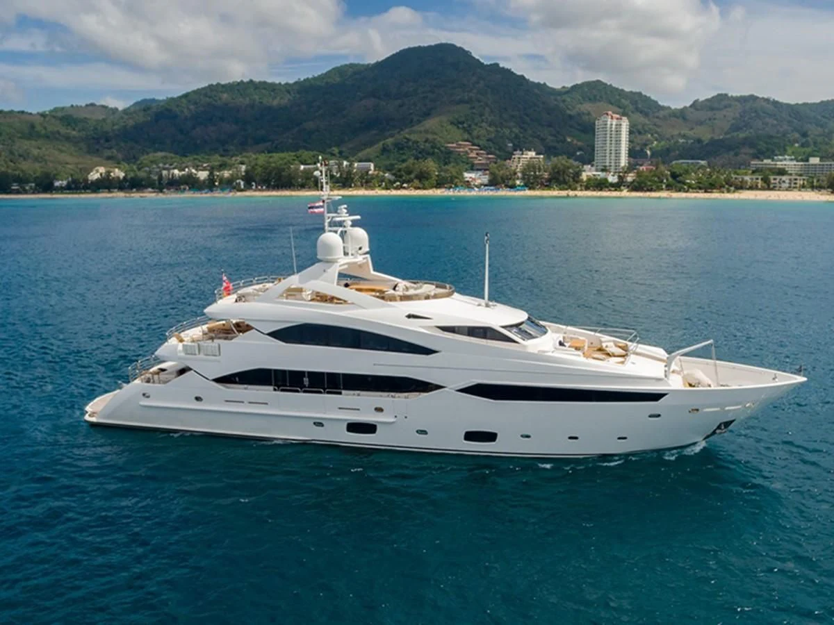 a white yacht in the water aboard ABOUT TIME Yacht for Sale